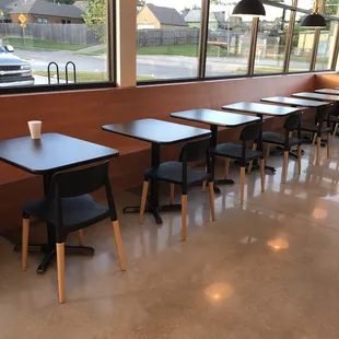 empty tables and chairs