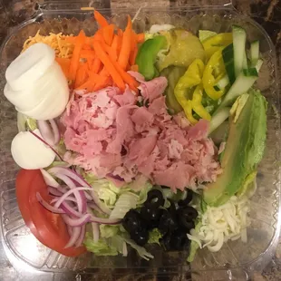 a salad in a plastic container