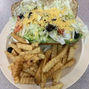 Three cheese avocado sub with fries