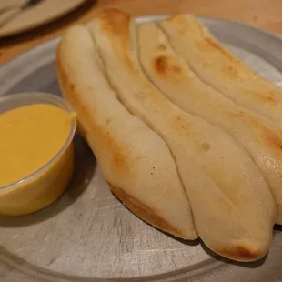 a hot dog with mustard