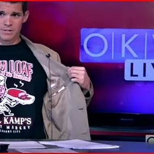 OklaVision Live showing off one of our Ham Loaf tees available for purchase anytime, so sport your carnivore fashion! #BillKampsMeatMarket