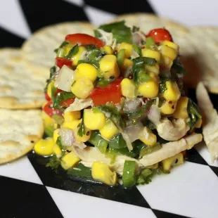 a corn salad on a tortilla