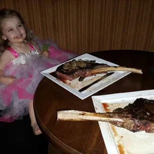So cute!  We special ordered these Tomahawk rib-eyes just for this little carnivore :)