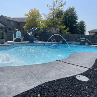 a pool with a water feature