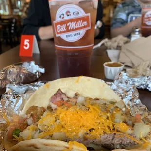 Brisket, potato, cheese breakfast taco and sweet tea