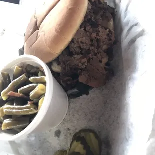a sandwich and pickles