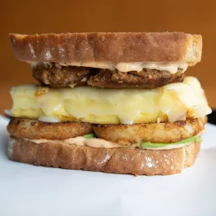 NOT A BREAKFAST SANDWICH--Chorizo sausage, custard egg, hashbrown, jalapeño jack cheese, avocado, chili garlic mayo, buttery garlic toast