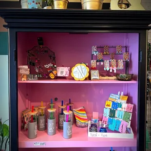 a display case filled with items