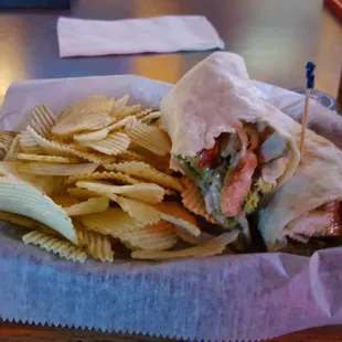 Grilled Chicken Caesar wrap with chips.