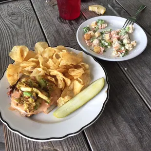 two plates of food on a picnic table