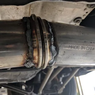 Horrible work. Welds were started/stopped multiple times as you can see. Flanges were angled and caused a leak that I had to readjust