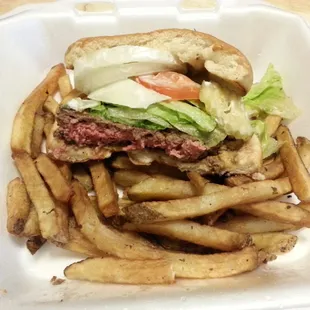 Burger and fries..to go. A little too rare for a burger