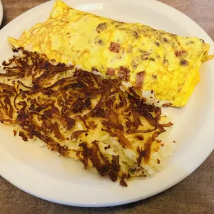 Meat Lovers Omelette Filled with Ham, Bacon and Sausage, Jack, American and Cheddar Cheese
