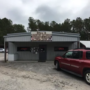 a car parked in front of a building
