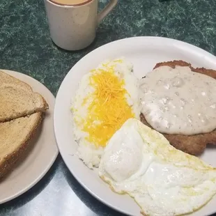 Country Fried Steak with some great sausage gravy and really good grits and eggs.