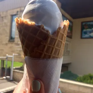 Vanilla soft-serve in waffle cone