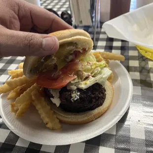 This double burger had enormous patties, mayo, mustard, ketchup, lettuce, tomato, and pickles.