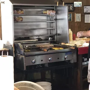 a man preparing food in a commercial kitchen