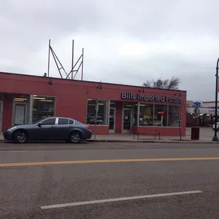 a car parked in front of a store