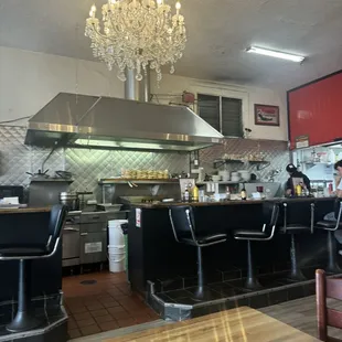 Chandeliers are still here! Charming, lovely old school spot.