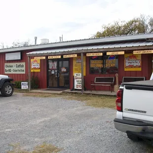 two trucks parked outside