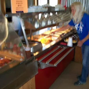 a woman serving food