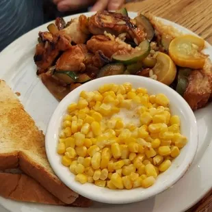 Bourbon chicken and corn.