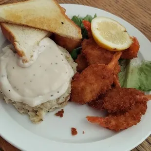 8 fried shrimp, mashed potatoes and gravy.
