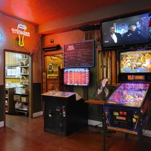 a row of pinball machines