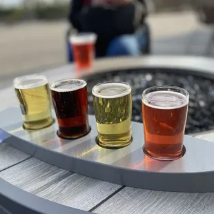 a row of beers on a table