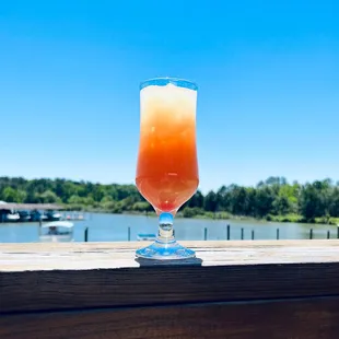 Billsburg Sunrise Hand-crafted Orange Juice &amp; Grenadine Cocktail.  Overlooking the water on the Billsburg Deck.