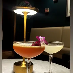 two cocktails on a table