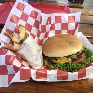 The Giant combo (1/2 pounder with 2 patties) with double cheese with fries and drink.