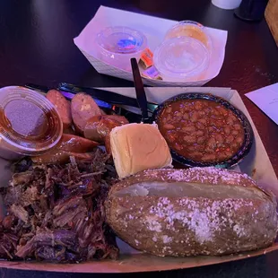 2 meat combo, brisket and jalapeño cheese sausage with baked potato and beans.