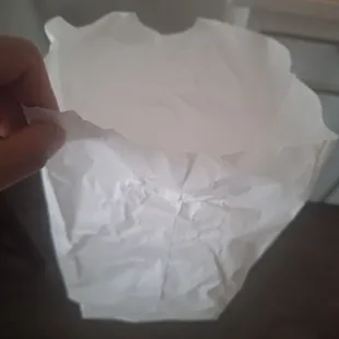 I forgot to take a photo of the food before finishing it so here is the paper bag that they served my Cali Burrito in ahahhahaha