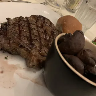 Ribeye with sautéed mushrooms