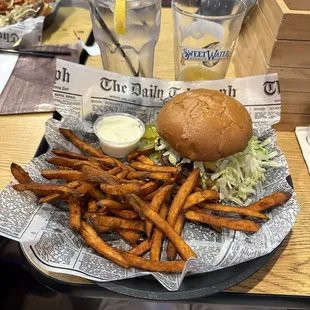 "Build your own burger" with sweet potato fries with a glass of apple cider. Delicious!
