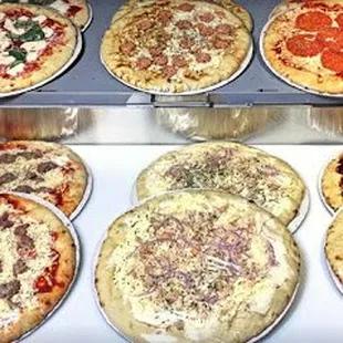 a variety of pizzas
