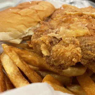 Huge, well seasoned pork chop sandwich