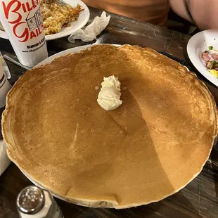a pancake with whipped cream