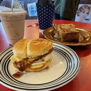 Gooey Goat Frappe, White Mocha, coffee cake, spicy bacon and egg sandwich.