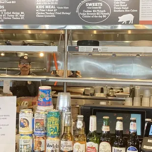 Kitchen behind the bar and beer selections