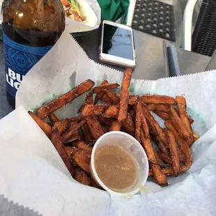 Sweet potato fries and honey cinnamon dipping sauce.