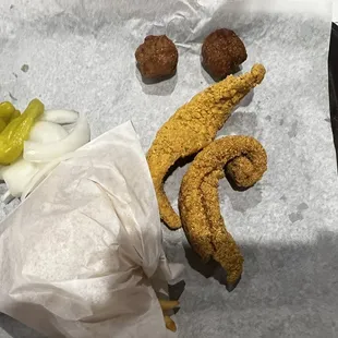 ows a fried chicken and a pickle