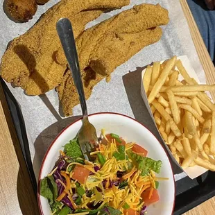 Catfish, side salad, hush puppies and fries.