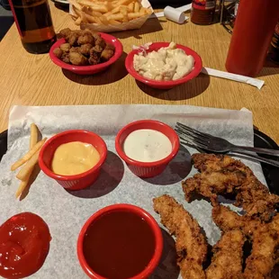 Chicken tenders, Mac &amp; cheese, fried okra, fries, chopped brisket sandwich