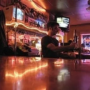 a man sitting at a bar