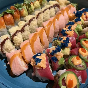 From top to bottom: BAD + boujee roll, crunch roll, 2/14 roll, blue wave roll, George Clooney toll