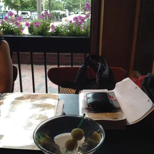 Wide-open street view. Nicely made martini.