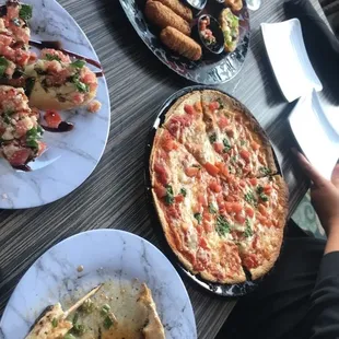 The bruschetta was absolutely fabulous as well as the Margarita pizza, chicken skewers, appetizer trio.